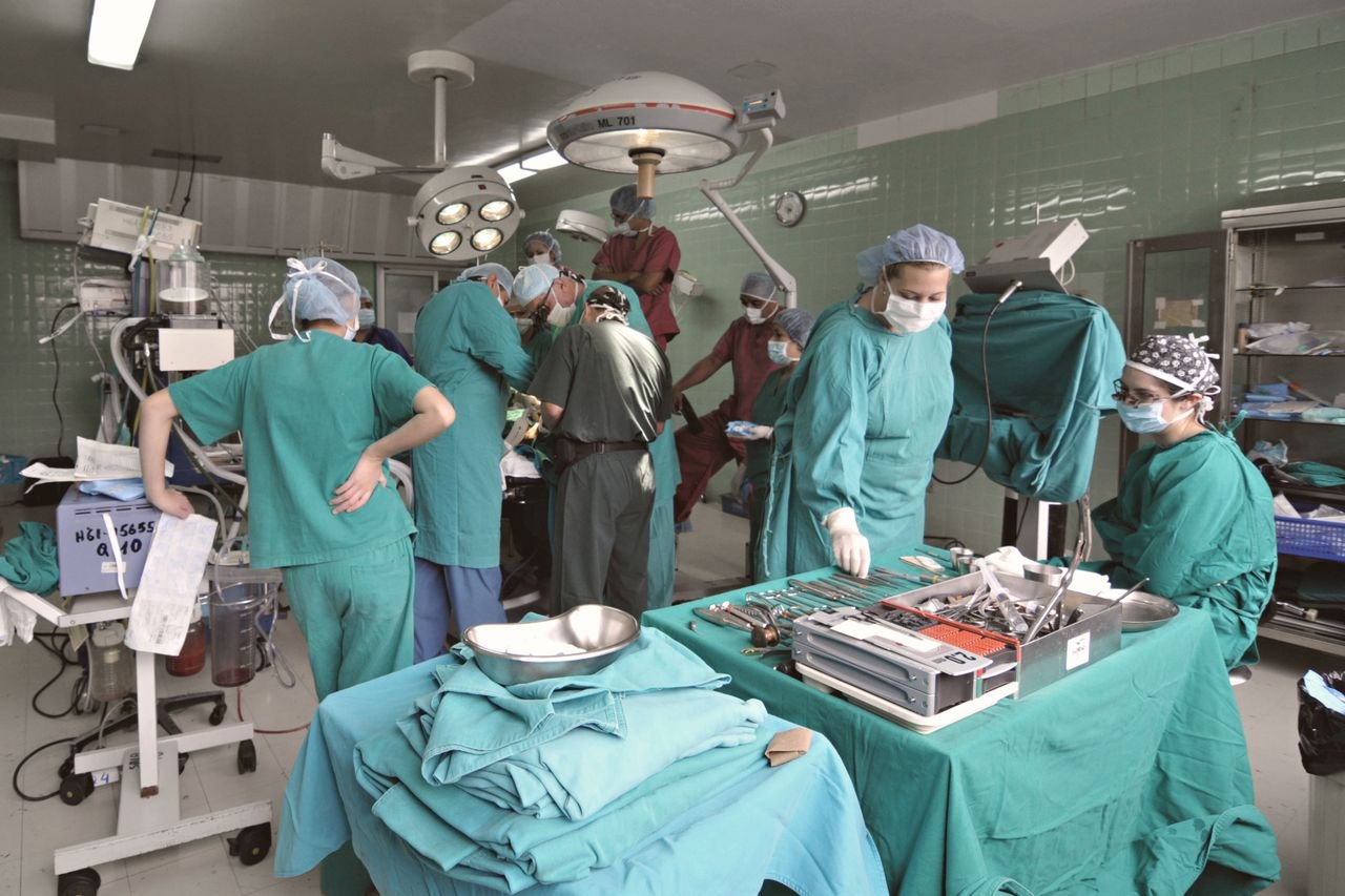 pexels photo 33916269 33916269 A surgical team performs an operation in a hospital operating room.